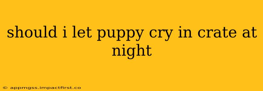 should i let puppy cry in crate at night